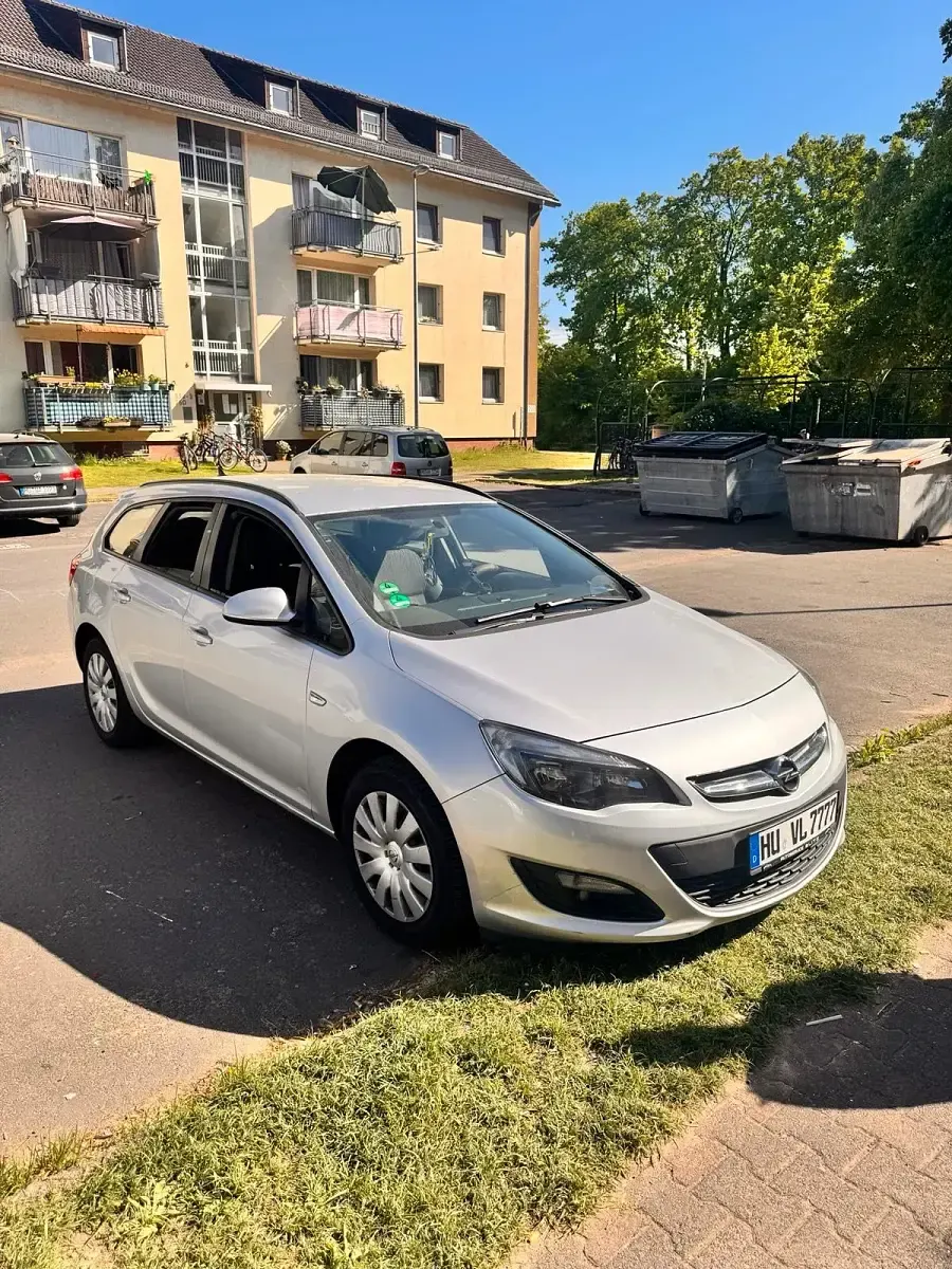 Second-hand Opel Astra 110 CP (80 kW) 2014 Gri Break