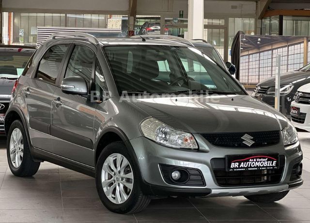 Grau Gebraucht 2013 Suzuki SX4 Club SUV | 9.990 € (Fairer Preis) - Bild 1/4