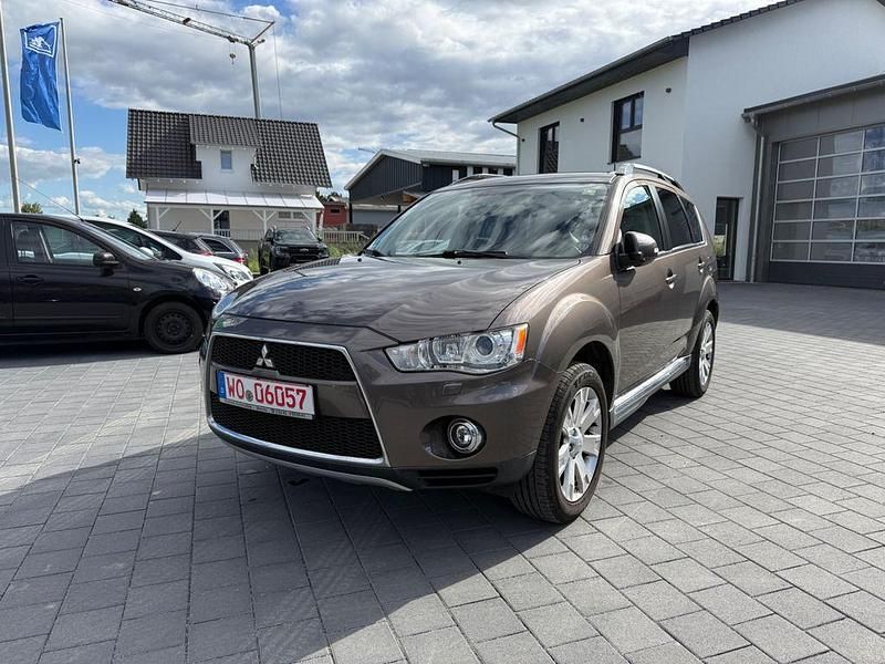 Braun Gebraucht 2012 Mitsubishi Outlander Motion SUV | 4.999 € (Superpreis) - Bild 1/4