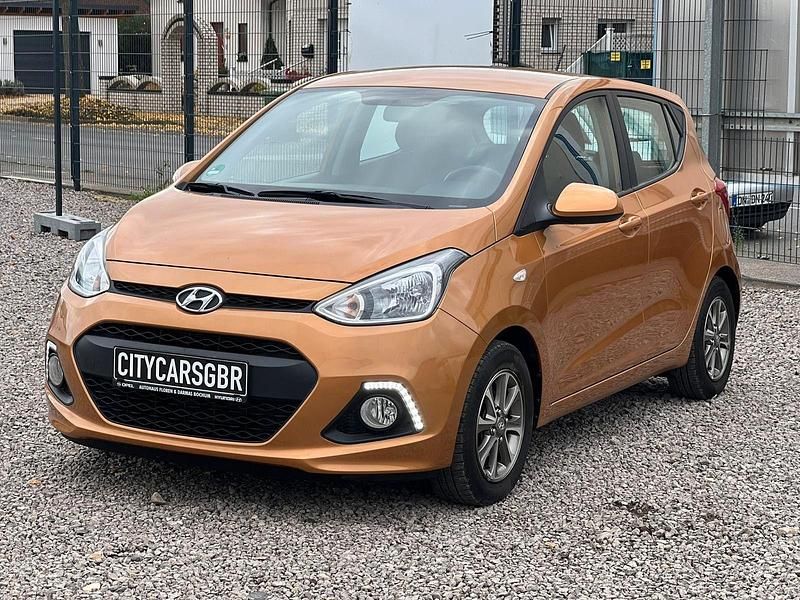 Orange Gebraucht 2015 Hyundai i10 Edition Kleinwagen | 7.350 € (Guter Preis) - Bild 1/3