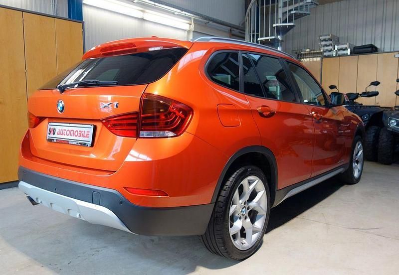 Gebraucht BMW X1 Performance 184 PS (135 kW) 2014 Valencia orange metallic SUV