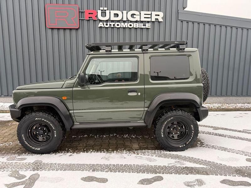 Grün Gebraucht 2021 Suzuki Jimny SUV | 34.990 € (Teuer) - Bild 1/4