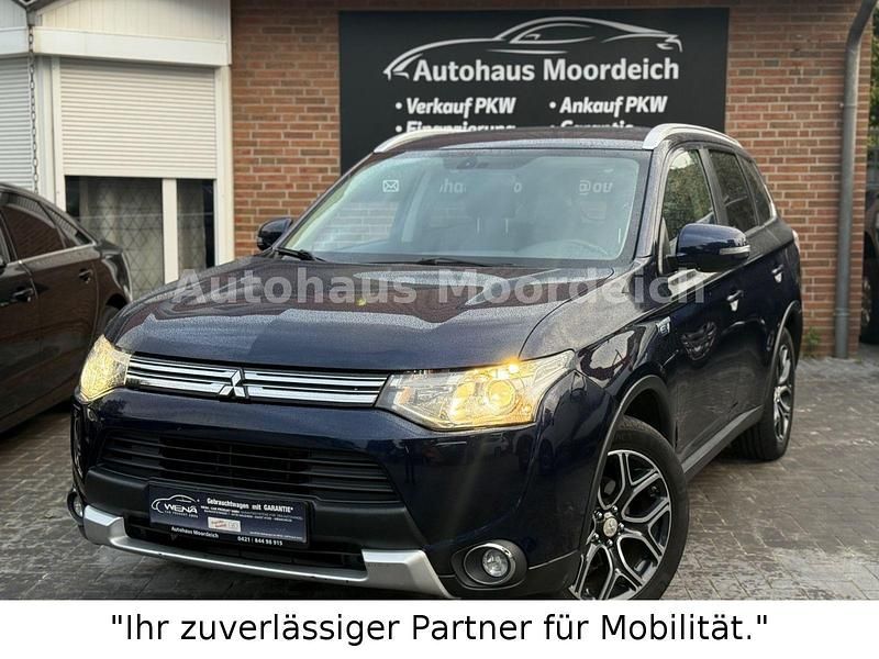 Blau Gebraucht 2015 Mitsubishi Outlander P-HEV Intense SUV | 10.999 € (Guter Preis) - Bild 1/4