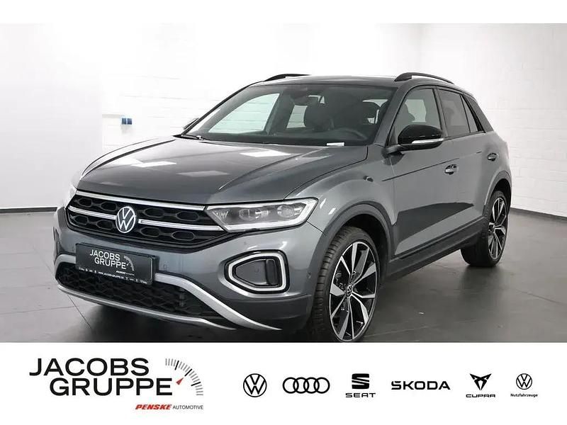 Grau Gebraucht 2024 VW T-Roc Style SUV | 31.249 € (Fairer Preis) - Bild 1/4