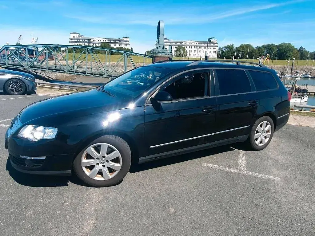 Second-hand VW Passat Sportline 160 CP (117 kW) 2009 Negru Break