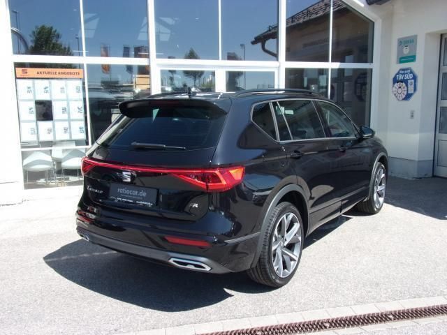 Deep schwarz metallic Gebraucht 2024 Seat Tarraco FR SUV | 43.930 € (Teuer) - Bild 1/4