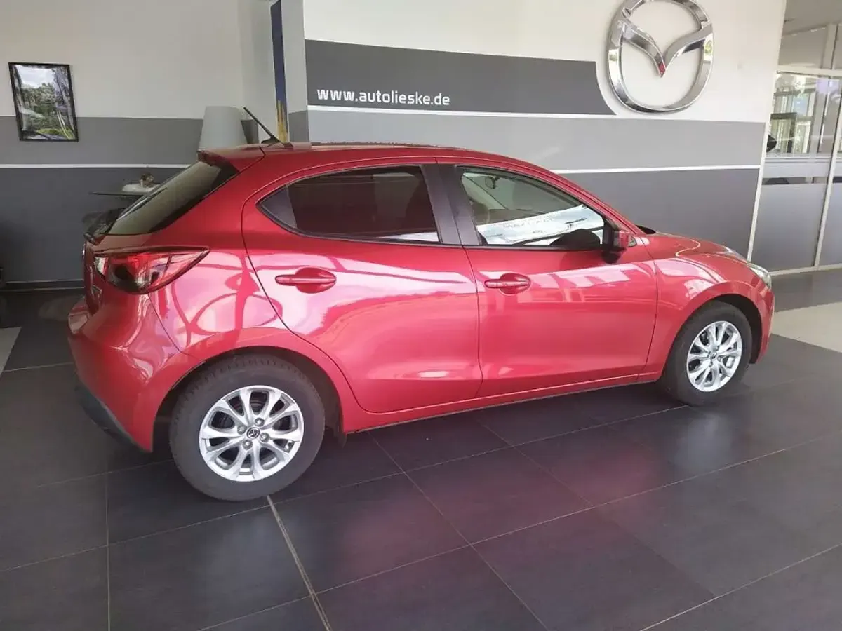 Gebraucht Mazda 2 Exclusive 90 PS (66 kW) 2015 Rubinrot metallic Kleinwagen