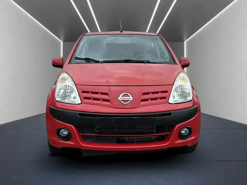 Gebraucht Nissan Pixo Acenta 68 PS (50 kW) 2010 Rot Kleinwagen