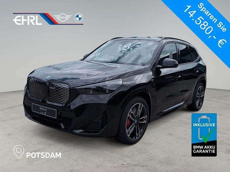 Schwarz Neu 2025 BMW iX1 Luxury Line SUV | 58.080 € (Fairer Preis) - Bild 1/4