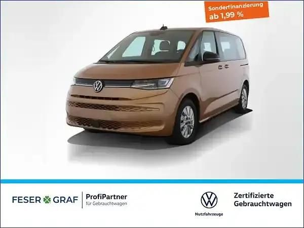 Copper bronze metallic Gebraucht 2024 VW Multivan Van / Kleinbus | 48.885 € (Superpreis) - Bild 1/4