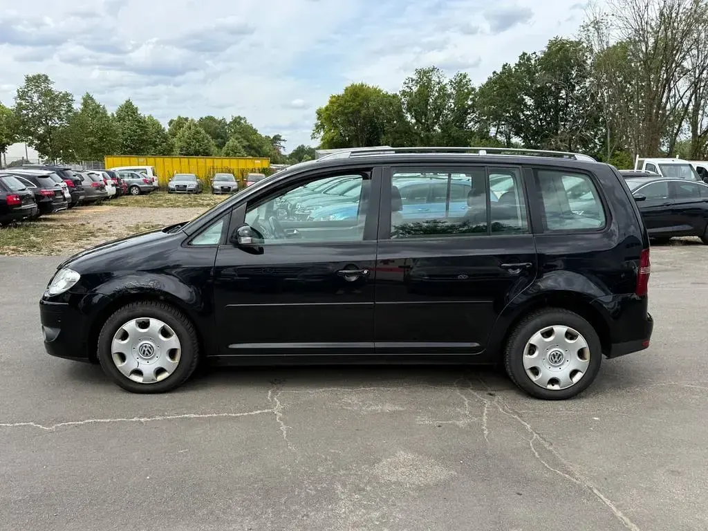 Gebraucht VW Touran Highline 105 PS (77 kW) 2009 Schwarz Van / Kleinbus