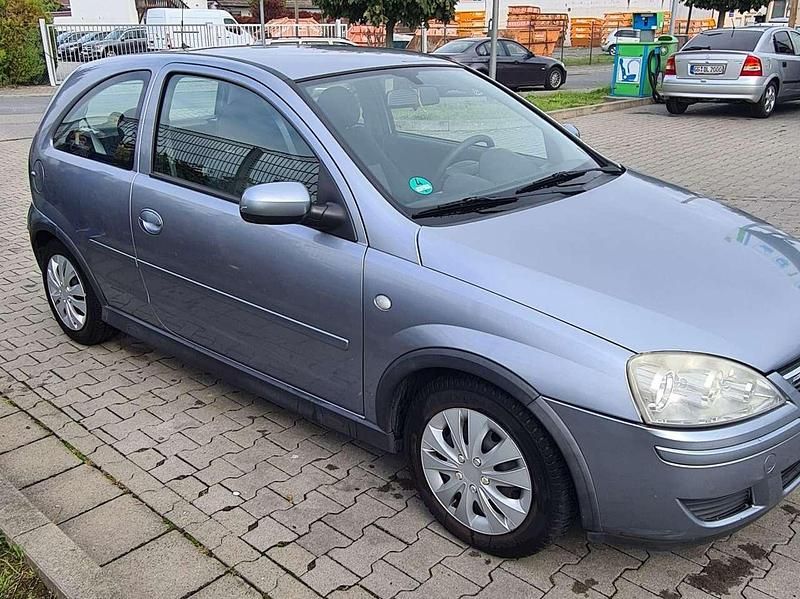 Grau Gebraucht 2006 Opel Corsa Cosmo Limousine | 1.000 € (Fairer Preis) - Bild 1/4