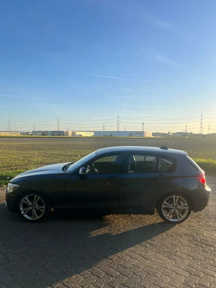 Gebraucht BMW 118 Sport Line 170 PS (125 kW) 2011 Grau Kleinwagen