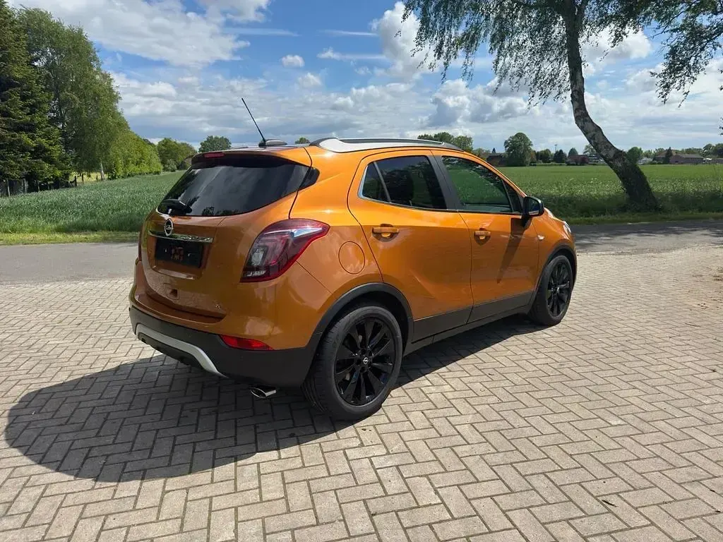 Używany Opel Mokka 140 KM (102 kW) 2017 Pomarańczowy SUV