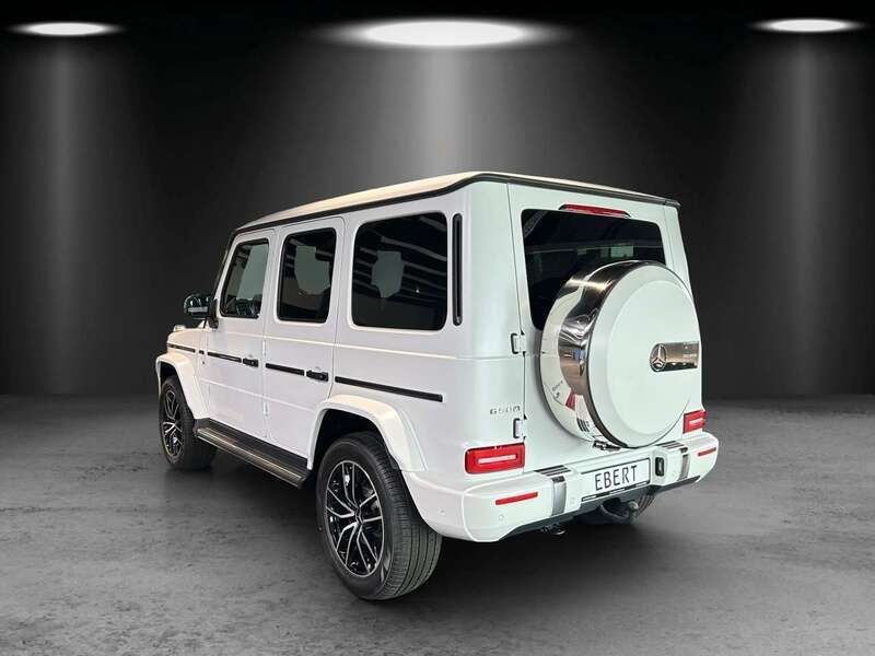 Gebraucht Mercedes G500 AMG line 421 PS (309 kW) 2024 Manufaktur opalithweiß magno SUV