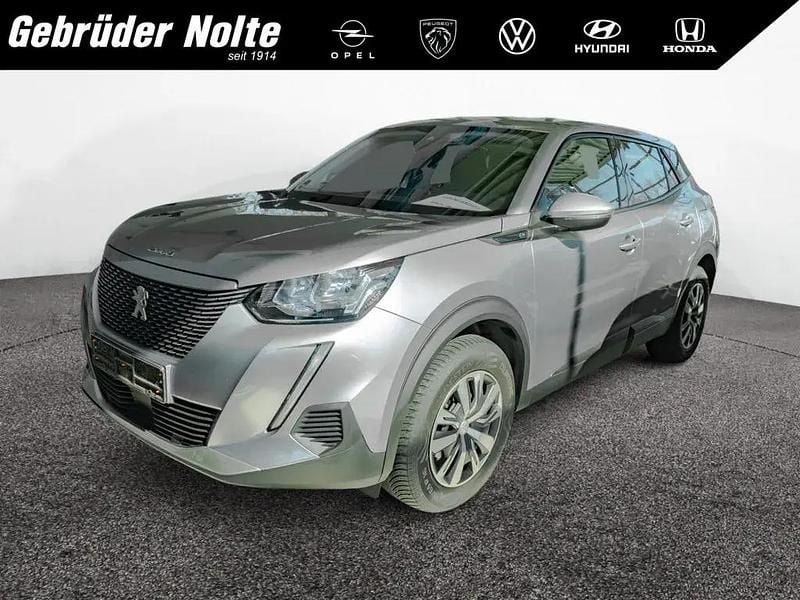 Grau Gebraucht 2022 Peugeot e-2008 Active SUV | 16.850 € (Superpreis) - Bild 1/4