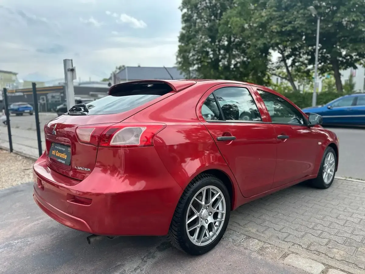 Gebraucht Mitsubishi Lancer 117 PS (86 kW) 2015 Rot Limousine