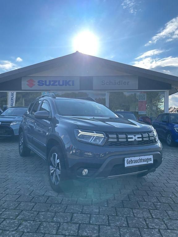 Grau Gebraucht 2024 Dacia Duster Journey SUV | 25.390 € (Fairer Preis) - Bild 1/4