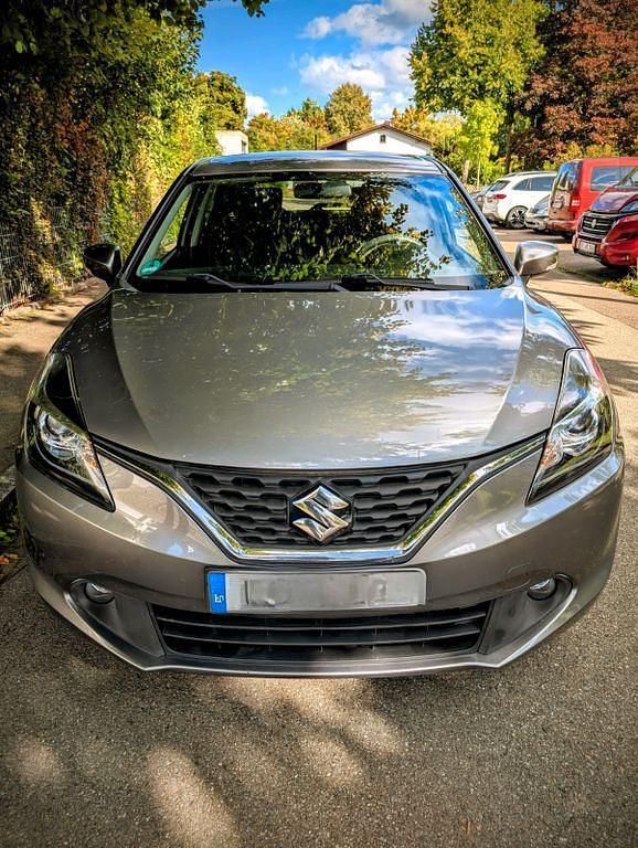 Grau Gebraucht 2019 Suzuki Baleno Limousine | 10.990 € (Fairer Preis) - Bild 1/4