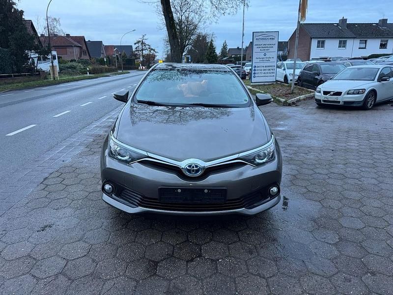 Gebraucht Toyota Auris Hybrid 136 PS (100 kW) 2016 Braun Limousine