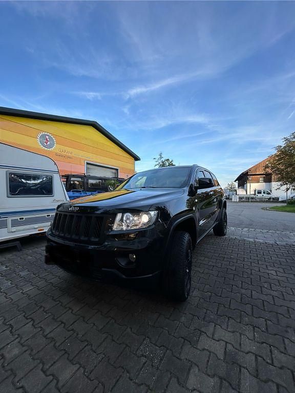 Schwarz Gebraucht 2012 Jeep Grand Cherokee Overland SUV | 8.500 € (Fairer Preis) - Bild 1/4