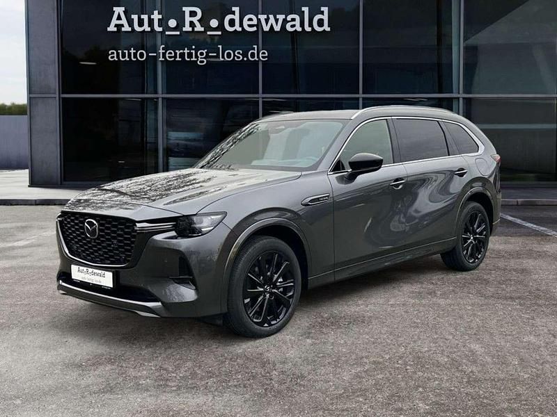 Machine grey metallic Gebraucht 2024 Mazda CX-80 Homura-Line SUV | 55.490 € (Guter Preis) - Bild 1/4
