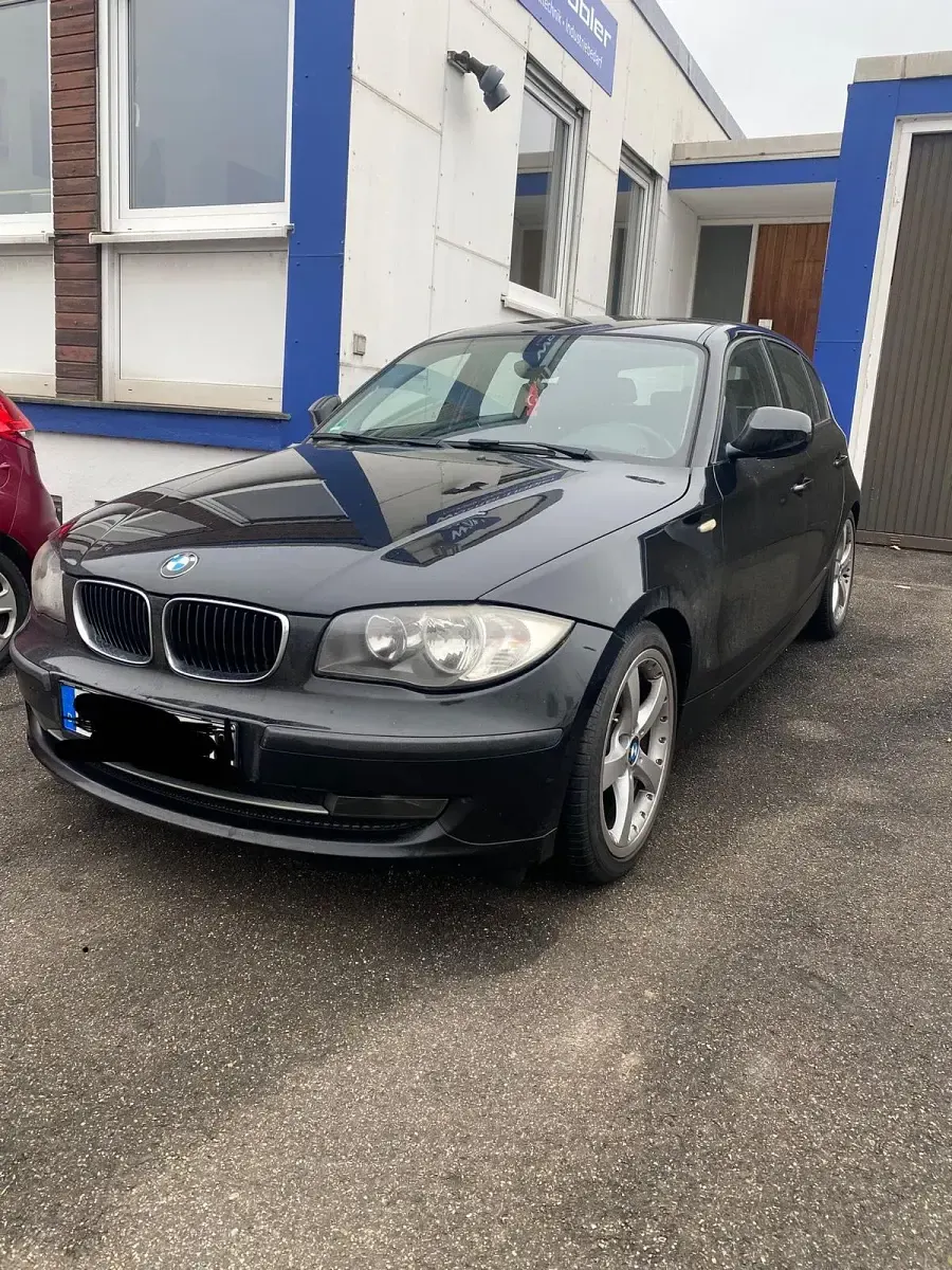 Second-hand BMW 116 122 CP (89 kW) 2010 Negru Hatchback