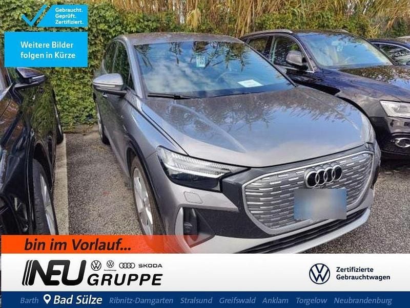 Grau Gebraucht 2024 Audi Q4 Sportback e-tron S-Line SUV | 38.479 € - Bild 1/4