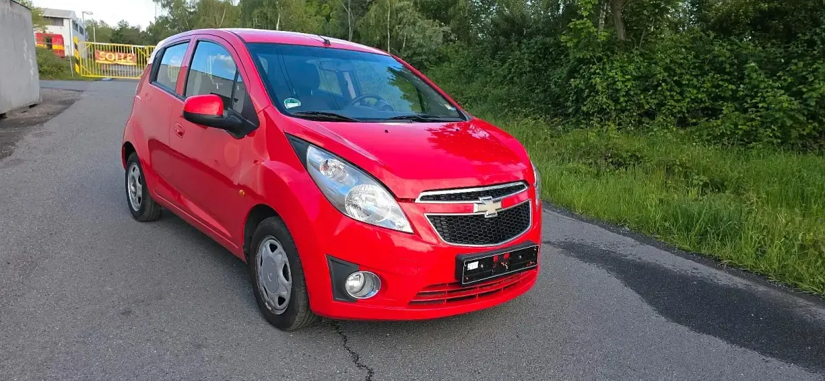 Usado Chevrolet Spark 68 HP (50 kW) 2010 Vermelho Citadino
