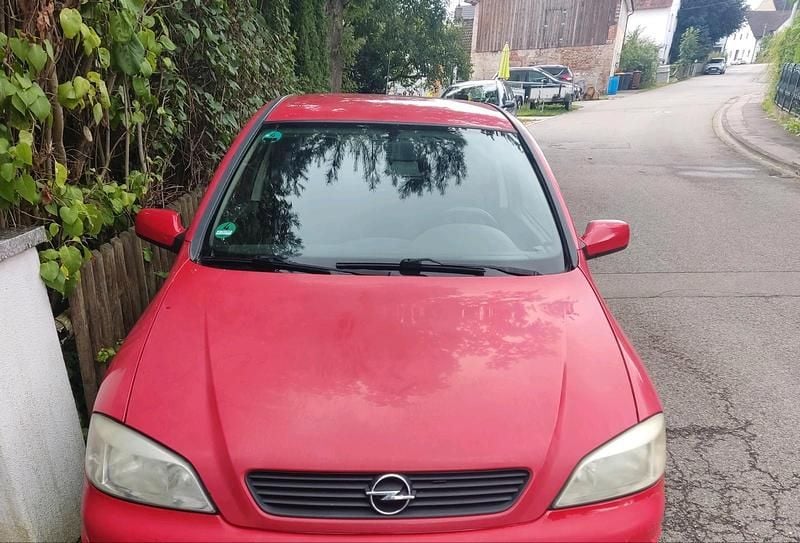 Second-hand Opel Astra 101 CP (74 kW) 2000 Roșu Coupe