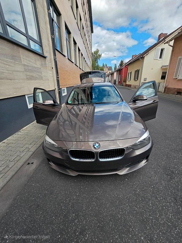Gebraucht BMW 318 143 PS (105 kW) 2013 Braun Kombi