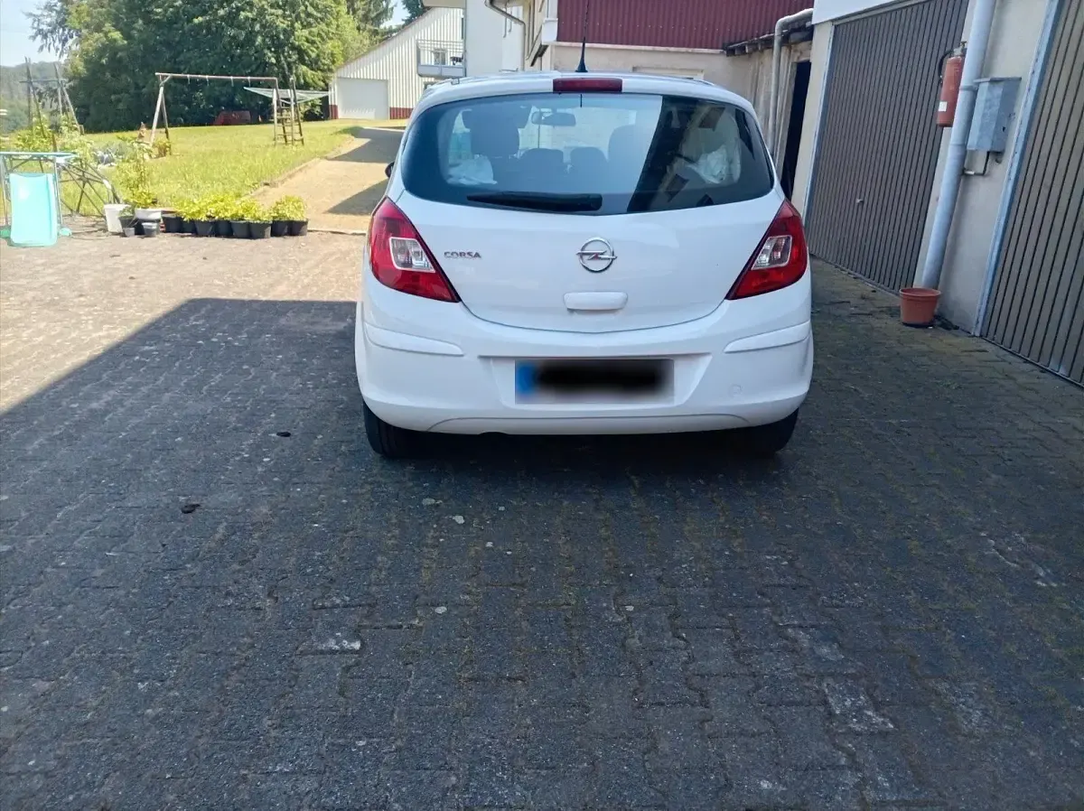 Gebraucht Opel Corsa 69 PS (50 kW) 2014 Weiß Kleinwagen