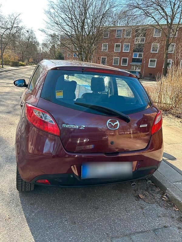 Gebraucht Mazda 2 75 PS (55 kW) 2012 Rot Kleinwagen