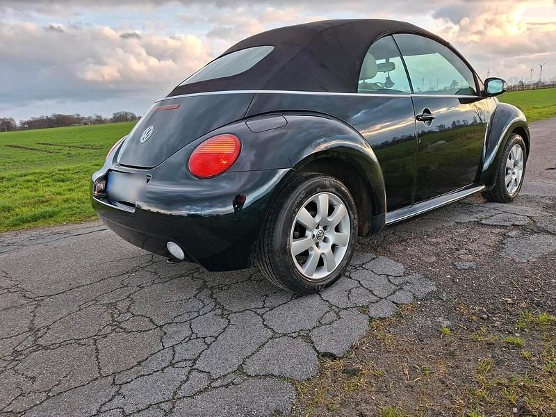 Gebraucht VW New Beetle 100 PS (73 kW) 2004 Schwarz Kleinwagen