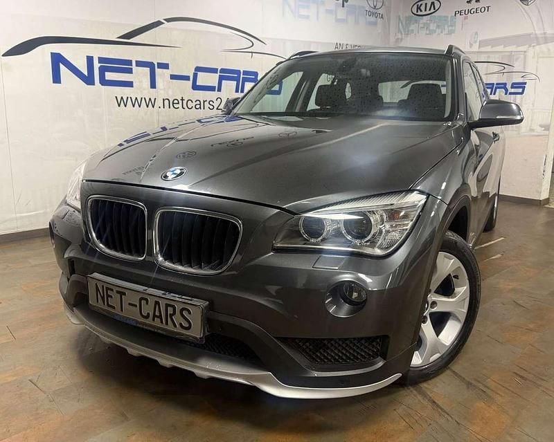 Grau Gebraucht 2015 BMW X1 Sport Line SUV | 10.950 € (Superpreis) - Bild 1/3
