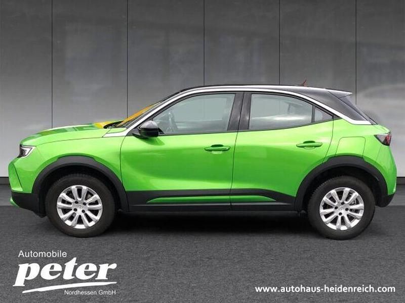 Gebraucht Opel Mokka Enjoy 101 PS (74 kW) 2024 Lackierung matcha green/typ aussenverkle (metallic) SUV