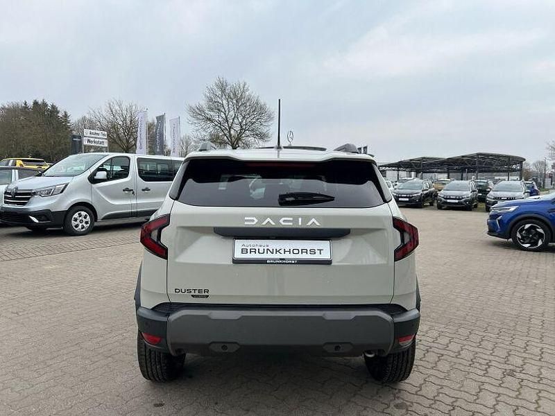 Gebraucht Dacia Duster Journey 141 PS (103 kW) 2024 Sandstonebeige SUV
