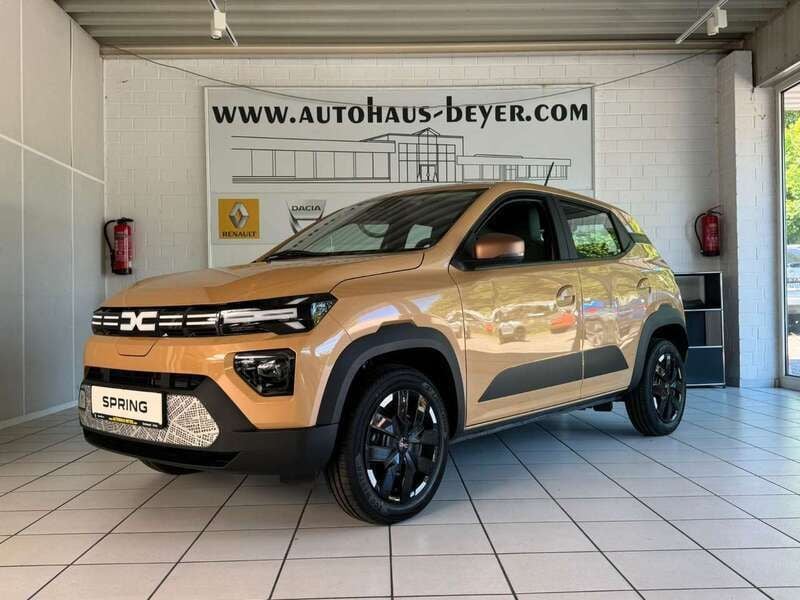 Gebraucht Dacia Spring Extreme 47 kW (65 PS) 2024 Beige Kleinwagen