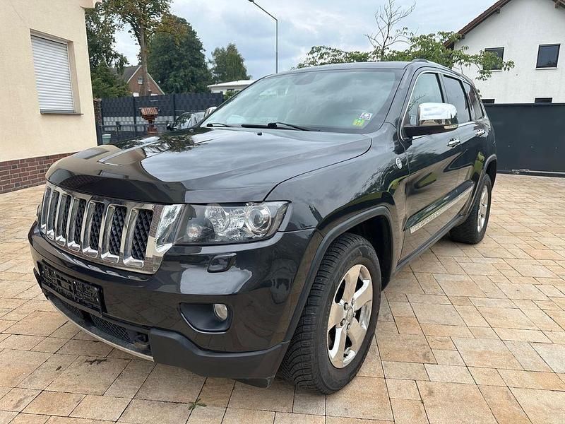 Grau Gebraucht 2010 Jeep Grand Cherokee SUV | 15.900 € - Bild 1/4