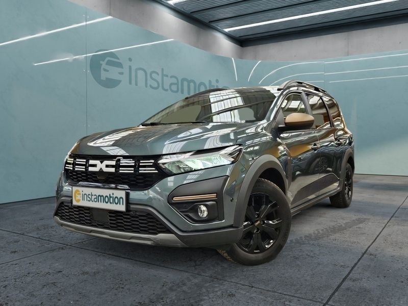 Grün Gebraucht 2024 Dacia Jogger Extreme Van / Kleinbus | 20.975 € (Fairer Preis) - Bild 1/3