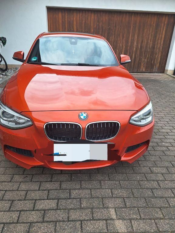 Orange Gebraucht 2014 BMW 125 Sport Line Kleinwagen | 12.650 € (Fairer Preis) - Bild 1/4