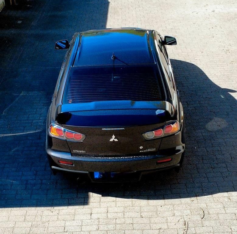 Second-hand Mitsubishi Lancer 295 CP (216 kW) 2008 Negru Berlinǎ