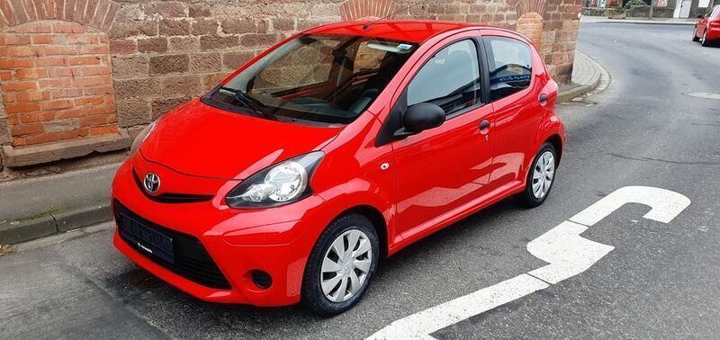 Rot Gebraucht 2014 Toyota Aygo Basis Kleinwagen | 4.300 € (Guter Preis) - Bild 1/4