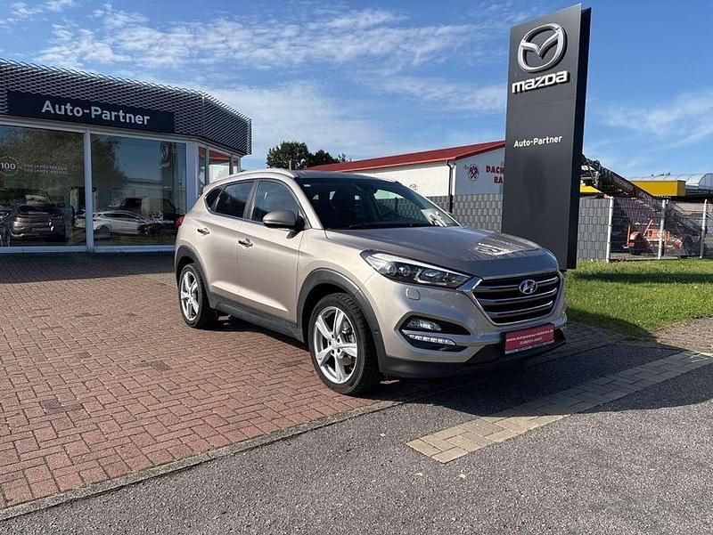 White sand Gebraucht 2017 Hyundai Tucson Premium SUV | 18.990 € (Fairer Preis) - Bild 1/4