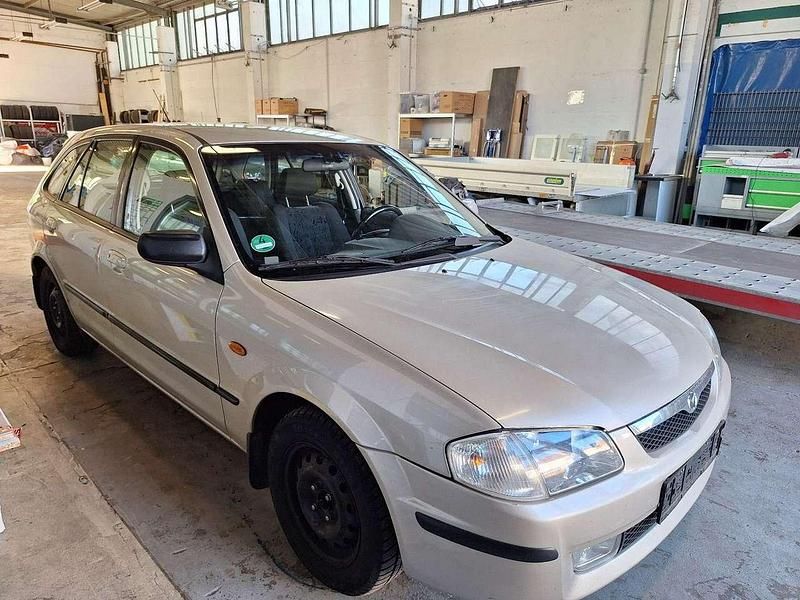 Gebraucht Mazda 323 114 PS (83 kW) 2002 Grau Kombi