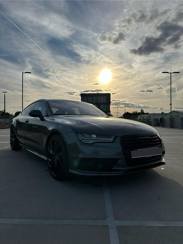 Grau Gebraucht 2017 Audi A7 Sportback Exclusive Kleinwagen | 28.999 € (Fairer Preis) - Bild 1/4