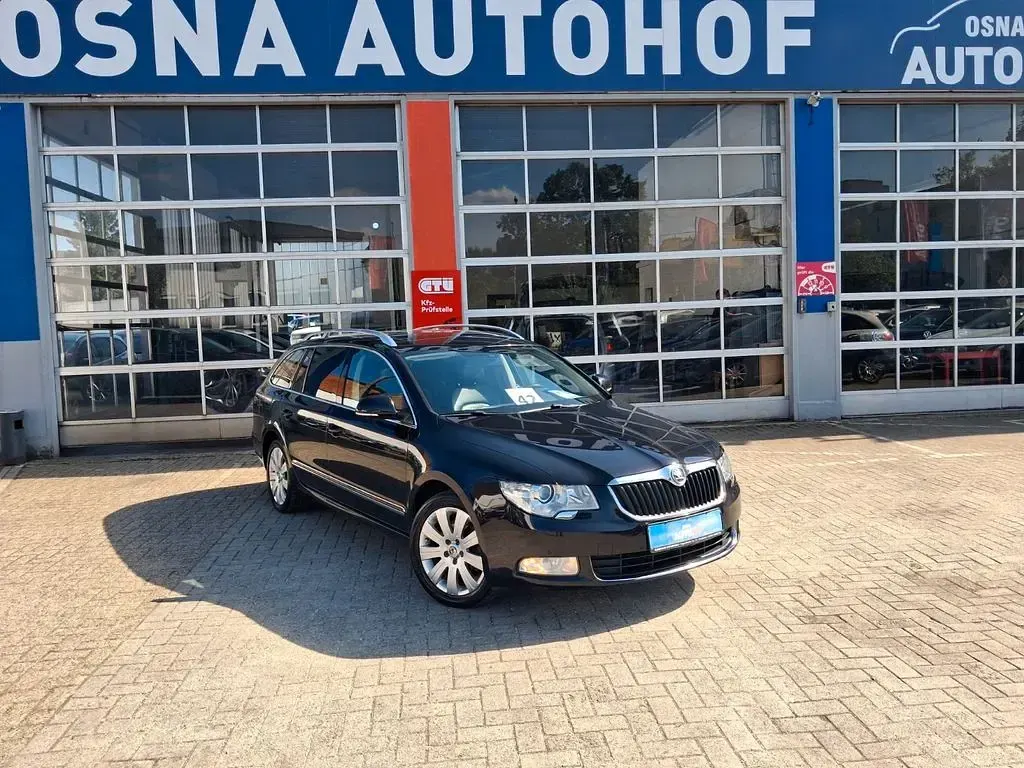 Używany Skoda Superb Elegance 170 KM (125 kW) 2012 Czarny Kombi