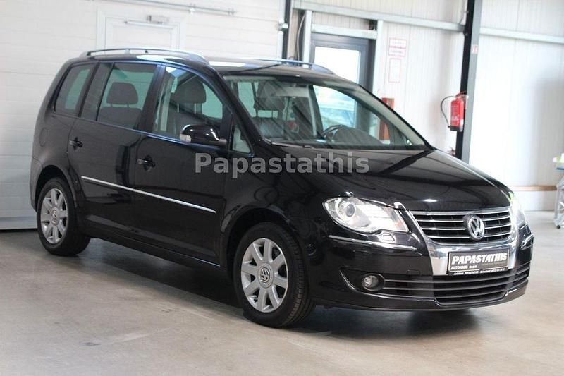 Schwarz Gebraucht 2007 VW Touran Highline Van / Kleinbus | 3.990 € (Fairer Preis) - Bild 1/4
