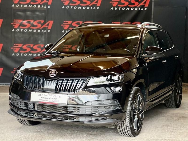 Schwarz Gebraucht 2021 Skoda Karoq SportLine SUV | 29.780 € (Teuer) - Bild 1/4