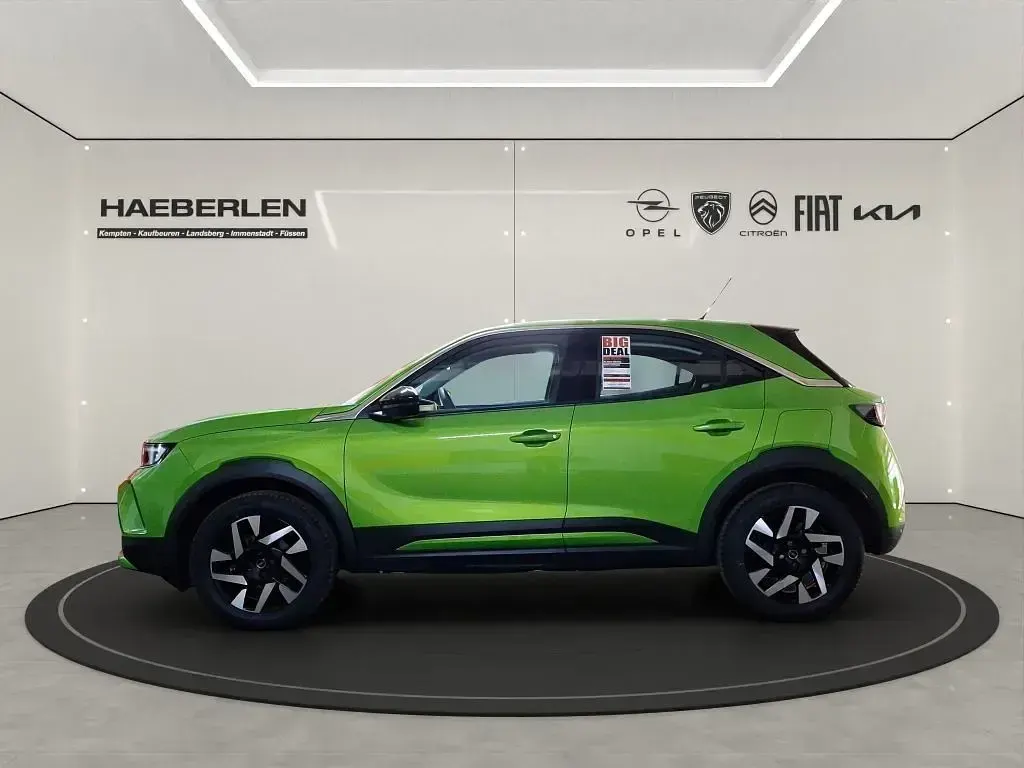 Gebraucht Opel Mokka Elegance 101 PS (74 kW) 2024 Lackierung matcha green/typ aussenverkle (metallic) SUV